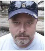 Delphi- For The Last Time- Ron Logan had a white mustache- Richard Allen  had a brownish, full goatee- Ron Logan was tall, 6'- Richard Allen is  short, 5'4"- Ron Logan wore glasses-