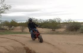 Asking $750 obo bike and pull behind. Coleman Powersports Mini Trail Bike
