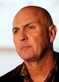 Impaled on a spear attached to a desert vehicle while arnold is jousting with patrick swayze in said transport. Arnold Vosloo