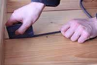Clean the floorboards on both sides of the gap. Filling Gaps In Floorboards Stopping Draughts From Floorboards How To Seal Floorboards Diy Doctor