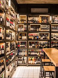 Bob S Select Bar And Liquor Shop Decorated With Liquor Lettering Wine Shop Interior Liquor Shop Wine Store Design