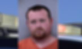 Man charged in police chase cries before judge