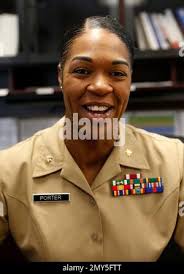 In this Aug. 5, 2016 photo, Maj. Shanelle Porter, commanding officer at the  Recruiting Station Chicago poses in her office in Des Plaines, Ill. (AP  Photo/Tae-Gyun Kim Stock Photo