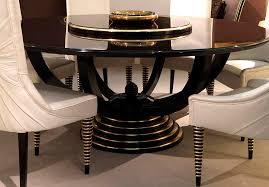 Aside from the gold dining table, the huge yellow flower on the wall looked very artistic as well as the furry chairs too! Luxury Black Gold Dining Table Taylor Llorente Furniture
