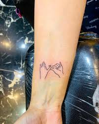 The idea to write down a nave of your beloved is not a new one, that's why there are a lot of heart tattoos with names like this one by anais b. Top 95 Best Pinky Promise Tattoo Ideas 2021 Inspiration Guide