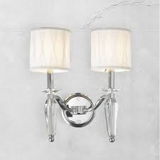 Frame it by placing sconce lights on either side. W23132c13 Gatsby 2 Light Chrome Finish Crystal Wall Sconce Light With White Fabric Shade