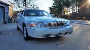 Image result for Light Ice Blue 2007 Town Car