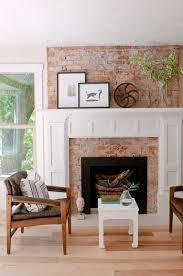 Exposed Brick Fireplace With White Painted Mouldings And Light Wood Floor Exposed Brick Fireplaces Farm House Living Room Modern Farmhouse Living Room