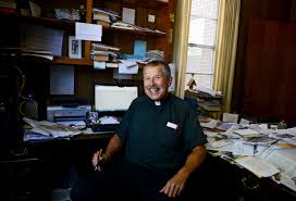 Father Dennis Morrow celebrates 40 years as priest, historian, police and  fire chaplain