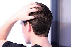 All aboard the short on sides long on top haircut trend that flatters any man's natural hair texture. Mid Length Side Part Hairstyle