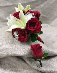 Ideas for unique and unusual flowers for guys and girls going to the prom! Red Attire Hand Tied Florals By Steen