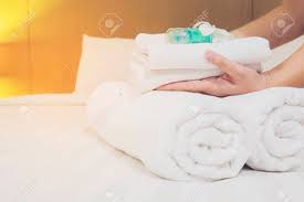 A wide variety of hotel towel set options are available to you, such as technics, use, and material. Lady Set Up White Towel Set On Bed In Hotel Room Stock Photo Picture And Royalty Free Image Image 135511334