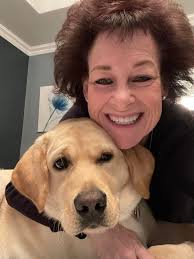 Dog finds peace in storytime with child