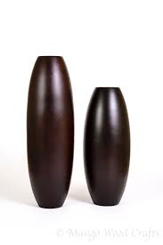 Leewadee large floor vase the carefully designed floor vases by leewadee impress with their unique shapes and the use of exotic mango wood. Floor Vases