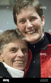 Ann Arbor, MI, USA. 22nd Mar, 2014. Diane VanDorn, left kisses Connie Greer  as they are married at the Washtenaw County Building