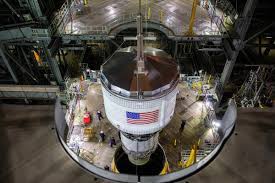 Unlike previously flown starships, during their high altitude hops, ship 20 will be the first to launch into space, thus requiring the entire windward side of the vehicle to be covered in tps tiles. Upper Stage Added To Sls Stack In Vehicle Assembly Building Spaceflight Now