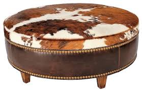 The duo cocktail ottoman was designed to provide multiple functions from coffee table to seating to a cozy spot to put your feet up. Leather And Cowhide Ottoman Southwestern Footstools And Ottomans By Your Western Decor Houzz