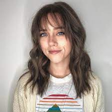 Slant bangs are a fairly common option for medium hair with bangs 2021. 53 Popular Medium Length Hairstyles With Bangs In 2021