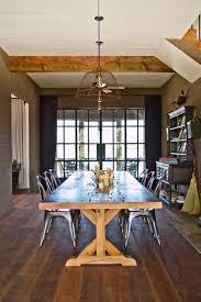 It is a perfect dining table where six people can sit comfortably and is a wonderful addition to your dining space. Industrial Farmhouse Dining Room With Wooden Table Hgtv