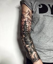 This style of tattoo is perfect for filler work—especially when used with vibrant color tattoos —because black line designs can cover empty skin and increase contrast at the same time. Mountain Landscape Forest Half Sleeve Tattoos For Women Grey Shirt White Background Half Sleeve Tattoo Mountain Sleeve Tattoo Tattoo Sleeve Men