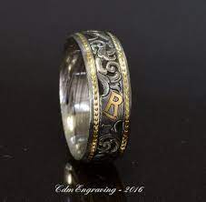 Hand Engraved Wedding Band With Cattle Brand Damascus With 18k And 22k Gold Hand Engraved Wedding Band Wedding Band Engraving Western Wedding Rings