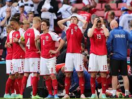 Christian eriksen of denmark goes down injured as teammates call for assistance during the uefa the euro 2020 game between denmark and finland in copenhagen was delayed after danish star. 8 Dbcmoaa5gb M