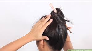 Thank you for typing this question. 3 Ways To Put Your Hair Up With Chopsticks Wikihow