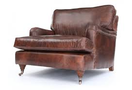 Find the perfect piece to accent your room or the ideal recliner to kick back and relax in. Howard Snuggler Vintage Leather Snuggler From Old Boot Sofas