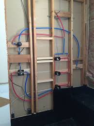 Finished Shower Plumbing With Pex Tubing A Shower Head Three Body Jets Shower Plumbing Diy Plumbing Bathroom Shower Panels