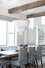 This White Beaded Chandelier Is The Perfect Addition To The Banquette Dining Set Interior Designer Brooke Dining Room Chandelier Interior Dining Room Design