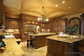 The original island was moved from the wall and turned into a large 3′ x 8′ island, which accommodates both storage for toys and seating. Gourmet Kitchen Design House Plans 26188