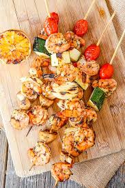 This easy recipe for citrus marinated shrimp skewers for grilling is perfect for a summer cookout and can be whip up a batch of these fresh citrus marinated shrimp skewers for grilling at your next bbq! Grilled Shrimp Skewers With Lemon Garlic Marinade Living Well Mom