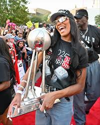 A'ja Wilson took a page out of MJ's book for her championship look 🏆🔥 Her  shirt was inspired by Michael Jordan's from 1993, the year he beat Phoenix  for his third ring
