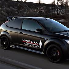 Probably the most intense umbrella corp car ive seen with working (fake) gatling guns on the sides. 1pair Umbrella Corporation Resident Evil Film Logo Car Stickers Large Vinyl Reflective Material Personality Decoration Side Door Body Wish