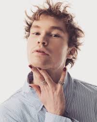 Actor Jacques Colimon has big hair and he doesn't care. In fact, his mane  is one of the mane attractions in certain scenes in the Apple Original  Film, “The Sky Is Everywhere,”