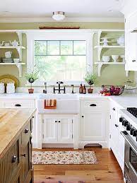 You won't believe how the homeowner turned a dated and brown kitchen into a light and bright one on a dime. Today S Country Kitchen Decorating The Budget Decorator