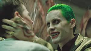 The image includes a joker card alongside a blurry picture of the clown prince of crime. Here S Your First Full Look At Jared Leto S Joker In Zack Snyder S Justice League Gamesradar