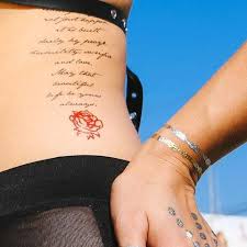 Rib cage tattoos that will make you go wow. Karrueche Tran S 6 Tattoos Their Meanings Body Art Guru