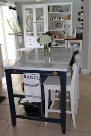 This saved us a ton of money! Southern Colonial Ikea Stenstorp Makeover With Marble Top And Valspar Volcanic Ash Paint Ikea Kitchen Island Ikea Stenstorp Marble Top Kitchen Island