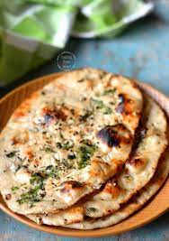 Garlic Naan Easy Whole Wheat Garlic Naan Cooking From Heart Recipe Indian Food Recipes Garlic Naan Naan