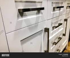 Pin by claudia watson on backsplash minimalist kitchen cabinets. White Kitchen Cabinets Image Photo Free Trial Bigstock
