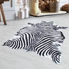 Argentina is known to produce the finest quality cowhides in the world. Kunstleder Fellimitat Teppich Modeo Zebra Motiv Teppich Florhohe 15 Mm Weiss Teppium Online Teppich Market