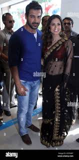 Bollywood actor John Abraham and film star Sunny Leone arrive for a press  conference supporting their upcoming movie Shootout At Wadala in  Ahmadabad, India, Friday, April 26, 2013. The film based on