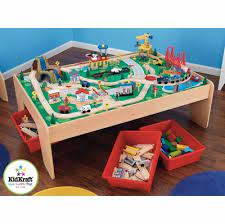 The waterfall mountain train set and table by kidkraft is loaded fantastic wooden rail features and includes a wooden table with 3 storage bins and 120 piece features of this set include a table with raised sides, airport complete with plane and helicopter, construction site with crane and road and rail. Kidkraft Waterfall Mountain Train Set And Table 17850 Kidkraft