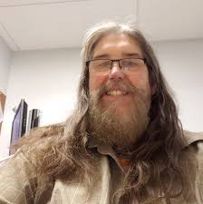 Glen showing off his guitar skills with Carl Jackson