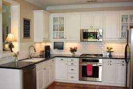 Making your backsplash the focal point Classic White Kitchen With Blue Brick Backsplash Description From Pinterest Com I Searche White Subway Tile Kitchen Kitchen Design Small Kitchen Inspirations