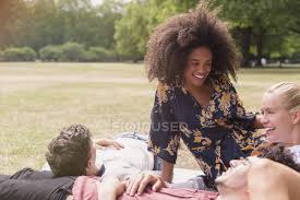 Huge collection, amazing choice, 100+ million high quality, affordable rf and rm images. Friends Hanging Out Relaxing On Blanket In Park Women Relaxation Stock Photo 199880000