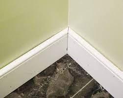 On one hand the baseboard is after you have installed the baseboard trim, you have to fill the holes and the gaps, as to get a neat look. Bathroom Renovation How To Install Baseboards Trim Young House Love