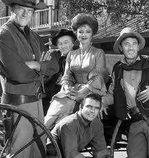 Marshal matt dillon keeps the peace in rough and tumble dodge city Top 10 Classic Tv Show Movie Ideas Ign James Arness Old Tv Shows Tv Westerns
