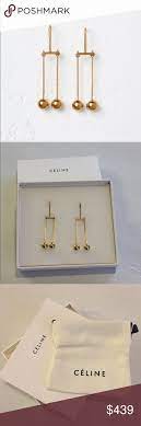 Celine Dot Mobile Earrings In Gold Brass New Jewelry Buying Guide Jewelry Packaging Luxury Jewelry Free shipping & returns available. pinterest